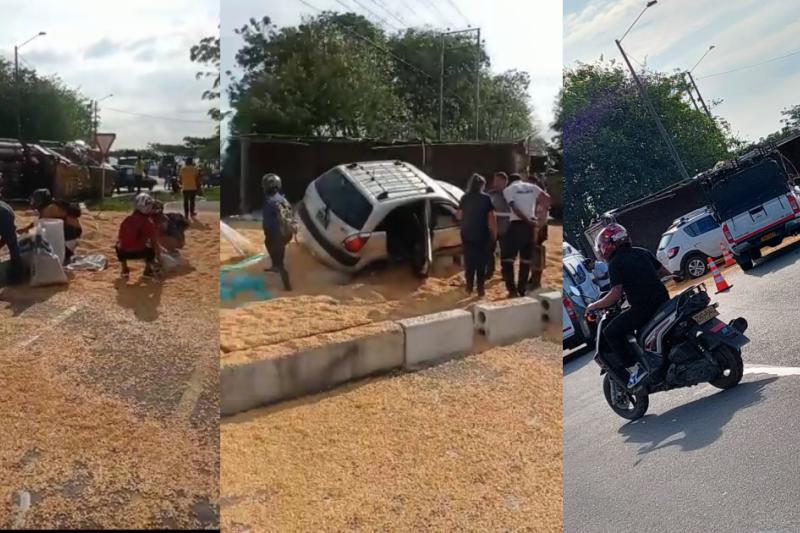 Camión de maíz se volcó en importante vía de Ibagué y la dejó cubierta con el grano: sin paso