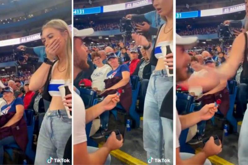 Un hombre se arrodilló en las tribunas de un estadio en Canadá para proponerle matrimonio a su novia, pero saca un anillo de piruleta, por lo que la joven reacciona al chiste pegándole y tirándole una bebida encima.